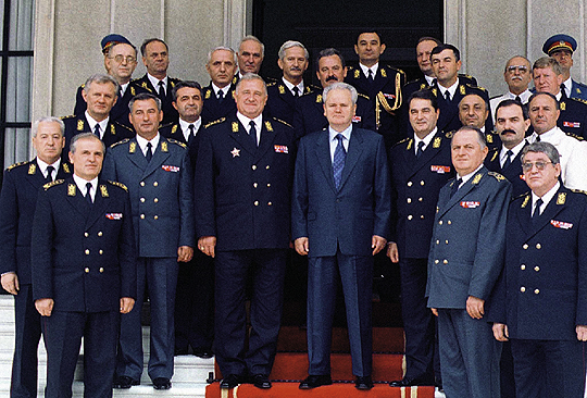 BEL03D:YUGOSLAVIA-ARMY-MILOSEVIC:BELGRADE,16JUN00 - Yugoslav President Slobodan Milosevic (C), Defence Minister Dragoljub Ojdanic (L) and Yugoslav Army Chief of Staff Colonel-General Nebojsa Pavkovic (R) pose with Yugoslav Army top brass after a ceremony marking the Yugoslav Army day in Belgrade June 16. Milosevic said the quality of the army's commanders and its modernisation was a strong factor of the country's defence.  im/TANJUG/Photo by Vlada Dimitrijevic    REUTERS