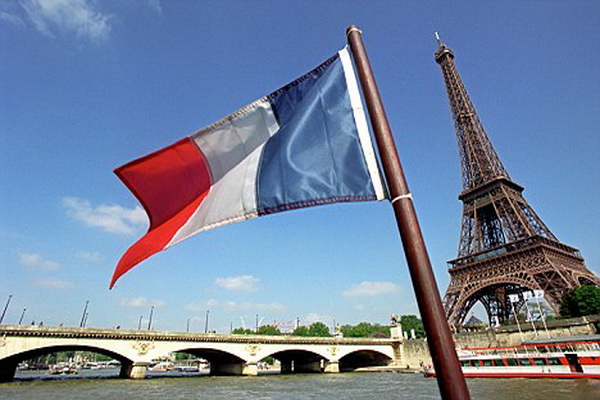 French Flag at The Eiffel Tower in Paris France