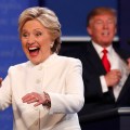 Democratic U.S. presidential nominee Clinton walks off the debate stage as Republican U.S. presidential nominee Trump remains at his podium after the conclusion of their third and final 2016 presidential campaign debate in Las Vegas