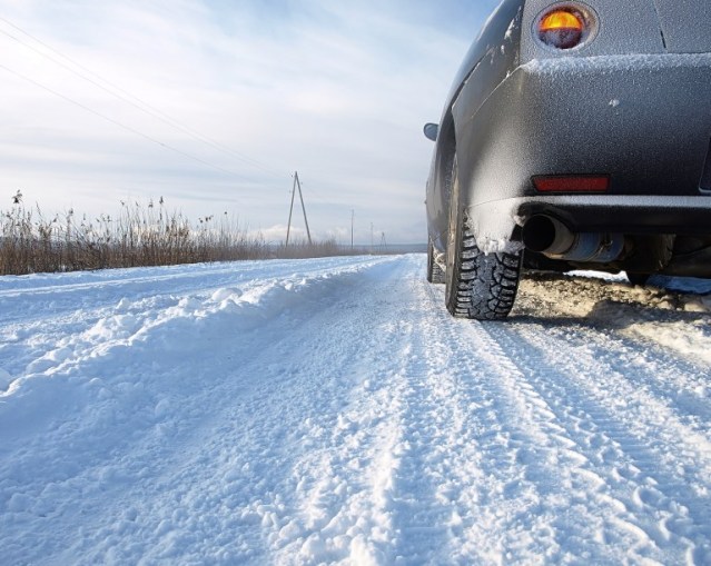 Car On A Snowy Country Road